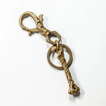 Load image into Gallery viewer, Carved Brass Thighbone