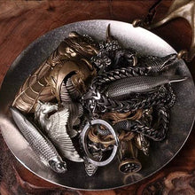 Load image into Gallery viewer, Rhodeus Plate used as a catch-all, filled with keys, chains and metal keepsakes